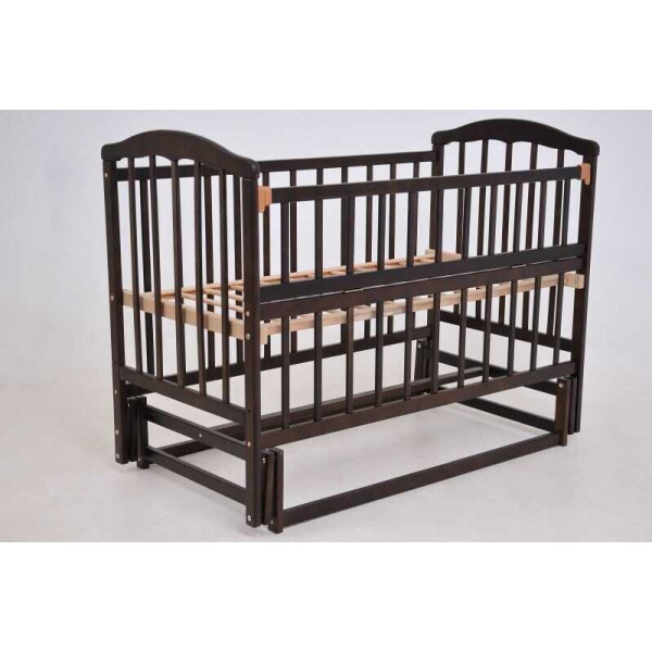 

Кроватка дерев. маятник - откидной борт "Чайка" тонированый (KB-01.СНВ-01) (1)