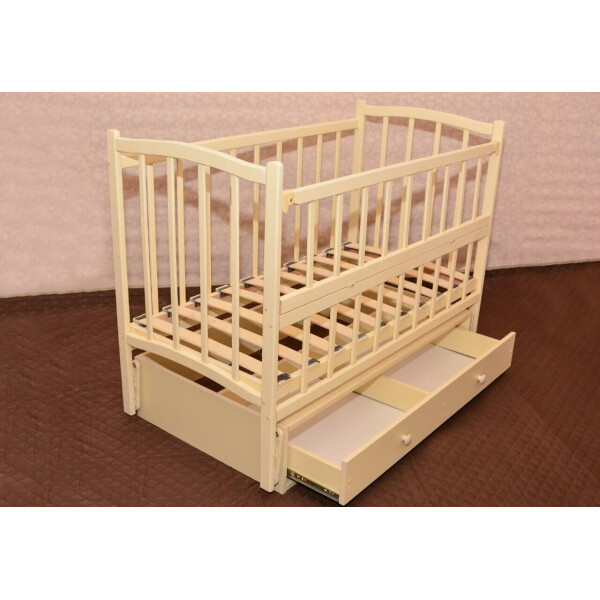 

Кроватка дерев. маятник+шухлядаКОМФОРТ" ваниль 90574