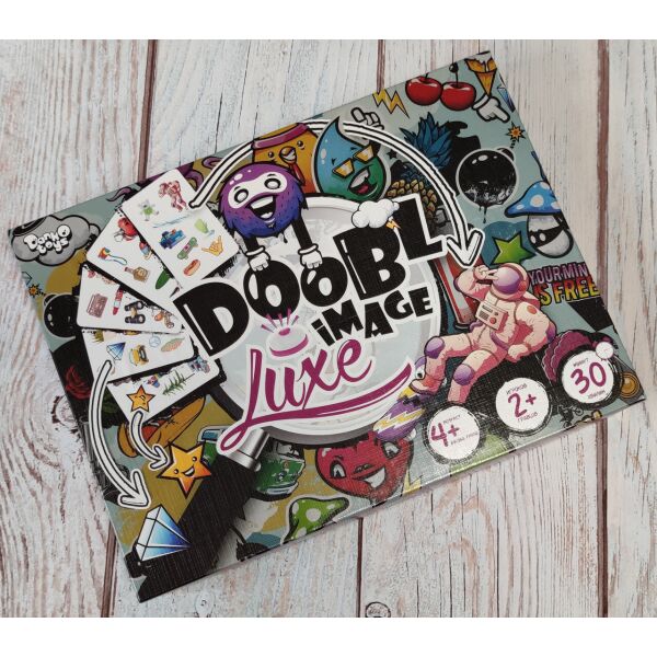 

Настольная развлекательная игра "Doobl Image Luxe" русская и украинская версия
