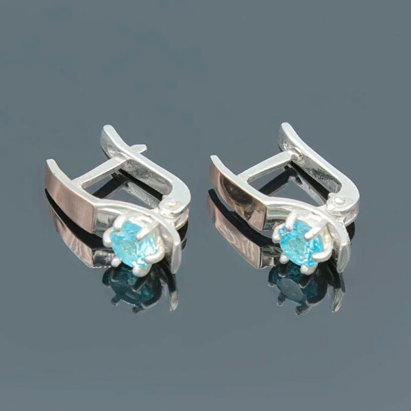 

Серебряные серьги Diva Хай-тек с золотыми вставками голубой фианит (027сг)