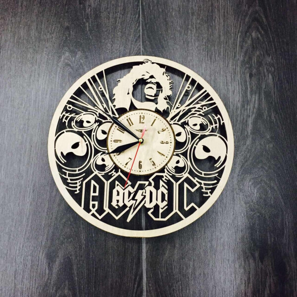 

Концептуальные настенные часы «AC/DC»