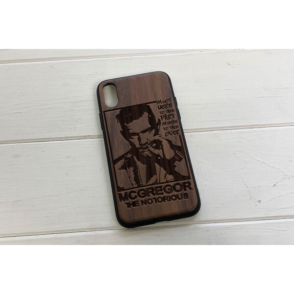 

Деревянный чехол SkinWood Американский орех для iPhone X с дизайнерской гравировкой MCGregor