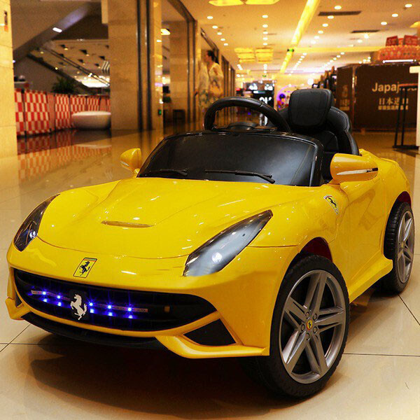 

Детский электромобиль Ferrari FL1078 Желтый