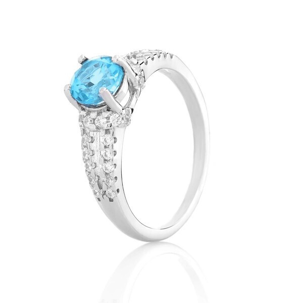 

Серебряное кольцо с топазом Swiss blue