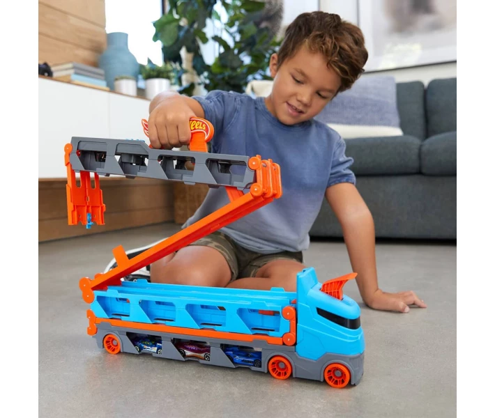 Фото - іграшковий гараж, паркінг, трек Трек Hot Wheels City Вантажівка-транспортер Супергонки 2 в 1 (GVG37)
