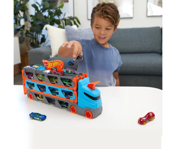Фото - іграшковий гараж, паркінг, трек Трек Hot Wheels City Вантажівка-транспортер Супергонки 2 в 1 (GVG37)