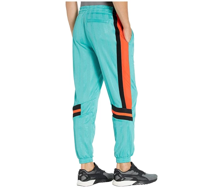 Фото - чоловічі спортивні штани Штани спортивні Puma LuXTG Luxe Woven Pants Blue Turquoise M