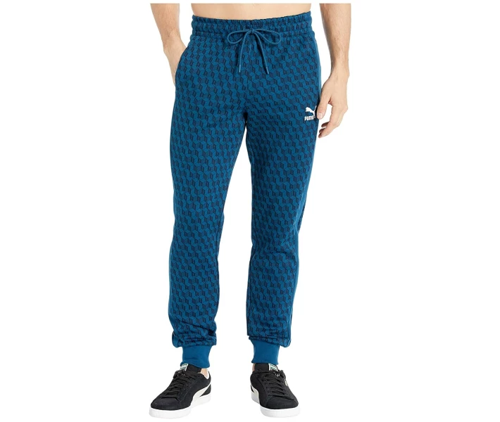 Фото - чоловічі спортивні штани Штани спортивні Puma Luxe All Over Print Track Pants Gibraltar Sea / All Over Print XL