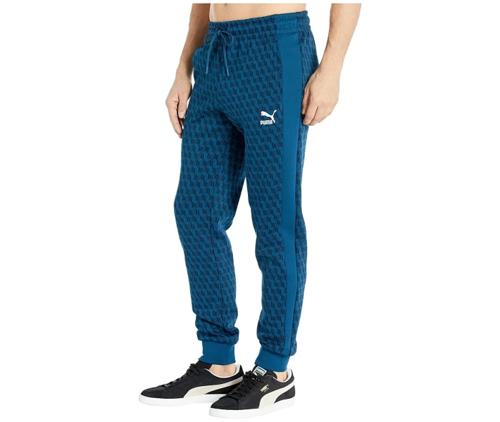 Фото - чоловічі спортивні штани Штани спортивні Puma Luxe All Over Print Track Pants Gibraltar Sea / All Over Print XL