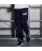Фото № 7 Спортивні штани Puma Tapered Fleece Navy / White XS